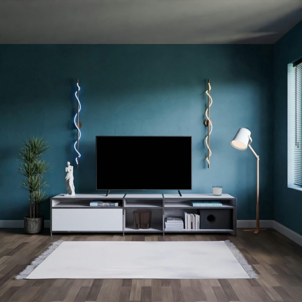 Elegant modern living room interior with a blue accent wall, television, and stylish lighting.